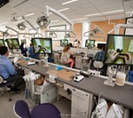 Custom made in West Germany, the equipment in the Dental Simulation Laboratory has “all the bells and whistles.” Each dental student is assigned a workstation, which includes a lifelike mannequin, LED chairside dental light, lab bench, and storage space for dental instruments and materials.