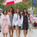 Rain drizzles on Elizabeth Desamero, D1, and her family at the White Coat Ceremony, held Sept. 28.