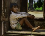 Orphan at a temple in Cambodia