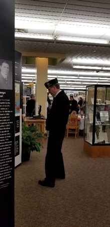 Man viewing the WWI exhibit at the Missouri library