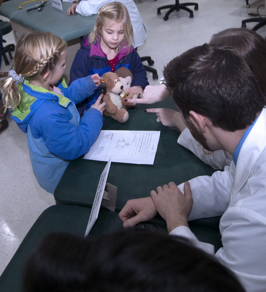 Children participate in the Teddy Bear Clinic